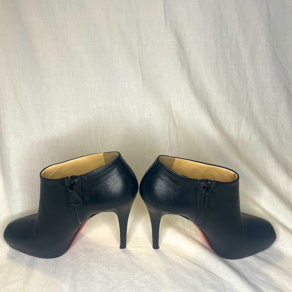 Christian Louboutin Miss Leather Platform Booties. Black leather